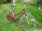 BIKE,  LADIES adult. Maroon hybrid bike,  18 speed,  front....